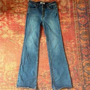 Free People flare blue jeans, button fly, size 28. Soft and stretchy.